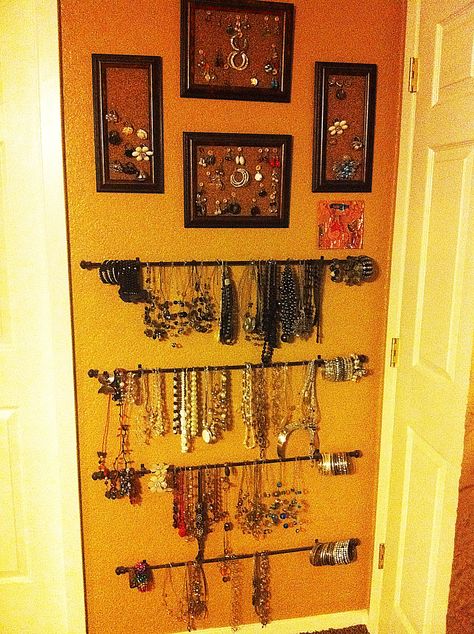 LOVE THIS!!!   I had to find a way to store all of my jewelry finds from NYC. I added cork board tiles to picture frames to hang my rings and earrings.  I grouped my earrings together with buttons and a straight pin.  I used cafe rods to hang my necklaces. I am able to place all of my bracelets on the outside of the cafe rods. Cork Board Tiles, Cafe Rod, Jewelry Wall, Hanging Necklaces, My Jewelry, The Cafe, Find A Way, Crafty Craft, Cork Board