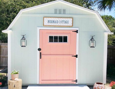 This very pretty pink cottage is a lovely haven for craft maker Megan Ballarini, and its name Mermaid Cottage suits its coastal style. #homedecor Click for more amazing garden sheds. Image: @Megan Ballarini/Instagram She Shed Exterior, Shed Paint Colours, Shed Exterior Ideas, Mermaid Cottage, Diy She Shed, She Shed Office, Shed With Loft, Palladian Blue, Shed Office