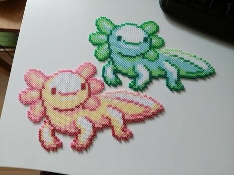 Perler Bead Axolotl Pattern, Axolotl Fuse Beads, Diy Minecraft Axolotl, Perler Beads Call Of Duty, Minecraft Axolotl Pixel Art, Perler Axolotl, Perler Bead Dragon Pattern, Green Perler Beads, Skyrim Perler Beads