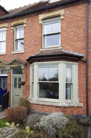 Bay fronted sash windows Double Fronted Cottage, Red Brick House Green Windows, Bay Window Exterior, Terrace House Exterior, Victorian Windows, Victorian Homes Exterior, Cottage Windows, Victorian Exterior, Green Windows