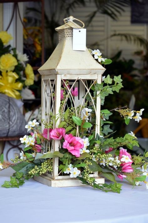 Ways Lanterns Can Give Your Home A Magical Touch (6) Spring Floral Arrangements Silk, Spring Lanterns, White Lantern, Deco Champetre, Spring Arrangements, Silk Arrangements, Spring Floral Arrangements, Lantern Ideas, Lantern Centerpieces