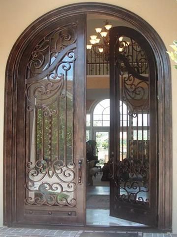 Wine Grotto, Wrought Iron Entry Doors, Wrought Iron Front Door, Porte In Ferro, Double Doors Exterior, Iron Front Door, House Flip, Nyc Interior Design, Iron Entry Doors