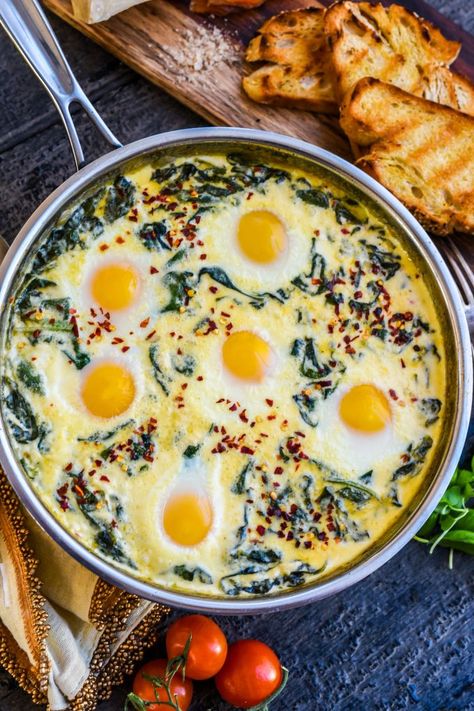 Baked Eggs in Ricotta Parmesan Creamed Spinach for a kicked-up brunch! From Denis the Prescott Recipes With Ricotta Cheese, Recipes With Ricotta, Vegetarische Diners, Ricotta Cheese Recipes, Food Cafe, Egg Muffins, Creamed Spinach, Baked Eggs, Breakfast Brunch Recipes