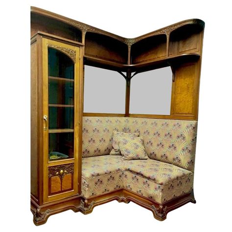 Majorelle Art Nouveau Presentation Bookcase reading corner Superb collector's bookcase in solid molded walnut, finely carved and panelled. Asymmetrical frame opening with solid door at the Left, a glass door and 4 open niches at the top. Locks and drawer handles in gilded bronze. Very fine original condition. Superb quality commissioned model Art Nouveau William morris upholstery fabric. This piece is attributed to the mentioned designer/maker. It has no attribution mark and no   official proof Vintage House Furniture, Louis Majorelle Art Nouveau, Art Nouveau Bookcase, Venice Bedroom, Bed Niche, Art Nouveau Apartment, Art Nouveau Bed, Art Nouveau Interior Design, Art Nouveau Fireplace