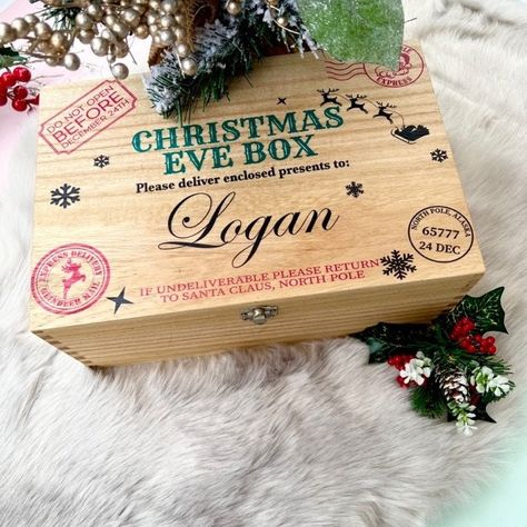 A beautiful Personalised Christmas Eve box for a lovely tradition to be reused every year on the night before Christmas. The wooden box is supplied ready to fill with lots of festive treats and goodies to delight your little one with a special delivery from Santa! Each box is beautifully made it has metal clasps and hinges, a beautiful box to ensure a lovely family tradition to be used for years to come. It is personalised for your little love along with a festive design using quality UV printin Family Christmas Box, Christmas Eve Box Ideas, Wooden Treasure Chest, Personalised Christmas Eve Box, Personalised Wooden Box, Elves Gift, Christmas Hamper, Present Christmas, Lovely Family