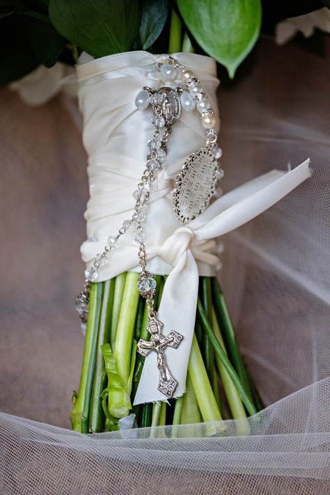 A charm in remembrance of a loved one and a special rosary put the finishing touches on this bouquet.  Photo courtesy of www.studiotran.com Mexican Wedding Traditions, Catholic Marriage, Disney Princess Wedding, Bouquet Photo, In Remembrance, July Ideas, Wedding Inspired, Wedding Traditions, Catholic Wedding