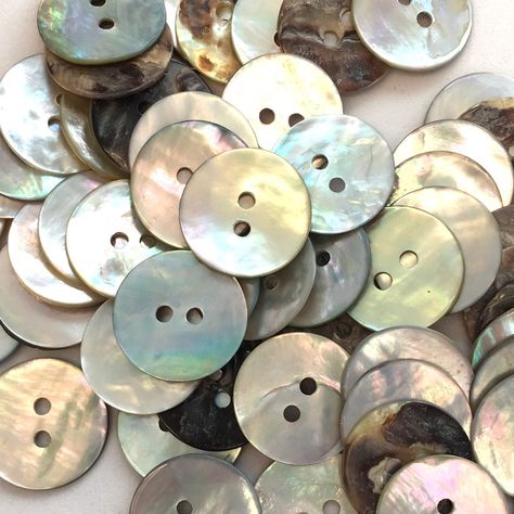 20mm cream AB shell buttons which are finished on one side and unfinished on the other. These buttons are approximately 1mm thick and have two holes These buttons are made from a natural product and hence there may be some variations in colour. Number in pack - 10 buttons Colour - Cream/natural Width - 20mm Material - shell SKU - BUT950 Natural Buttons, Silver Keychain, Sewing Buttons, Button Art, Shell Buttons, Button Crafts, Sewing A Button, Pearl Buttons, Mother Of Pearl Buttons