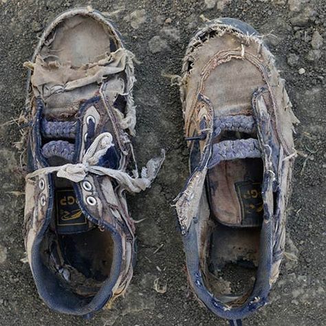 Excellent project by Shannon Jensen who photographed the remains of Sudanese refugees’ worn  tattered shoes (via Feature Shoot) Refugees Art, Ankle Sneakers, Homeless People, Long Walks, Slip On Sneakers, Types Of Shoes, Leather Sneakers, Boat Shoes, Hiking Boots