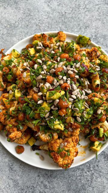 Caitlin Latessa-Greene on Instagram: "ROASTED HONEY-PAPRIKA CAULIFLOWER & CHICKPEA SALAD! SO bomb. I freaking LOVE roasted cauliflower dishes and this one is simply addictive. So much flavor! Fresh and delish!! • • • One medium head cauliflower, cut into florets 1 can chickpeas, skins removed (optional but I find they roast better when removed) 2.5 tbsp honey, divided (use agave for vegan) 3 tbsp olive oil, divided ¾ tbsp paprika ¾ tsp salt 1 tsp garlic powder 1 avocado, chopped ½ cup chopp Roasted Honey Paprika Cauliflower Chickpea Salad, Roasted Honey Paprika Cauliflower, Roasted Cauliflower And Chickpeas, Paprika Cauliflower, Cauliflower Chickpea Salad, Honey Cauliflower, Cauliflower And Chickpeas, Cauliflower Chickpea, Pan Roast