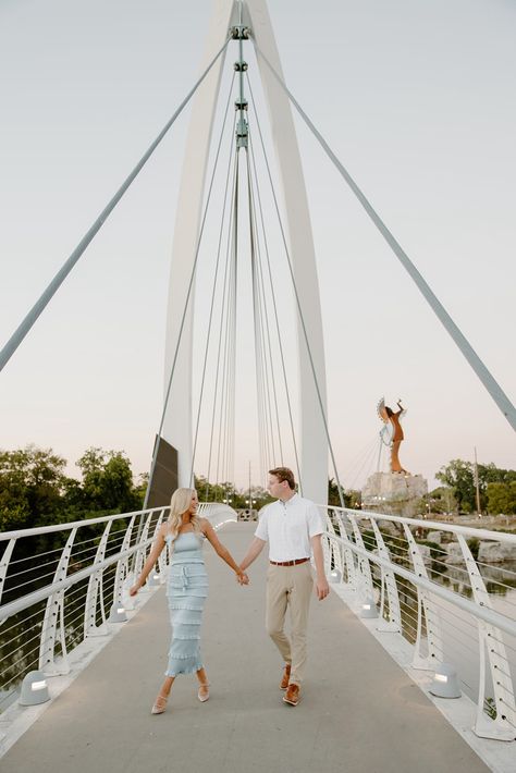 keeper-of-the-plains-wichita-kansas-bridge-over-arkansas-river- Engagement Photography Poses, Wichita Kansas, Engagement Poses, Romantic Evening, Photographer Branding, Wedding Announcements, Home Wedding, Photo Inspo, Wedding Tips