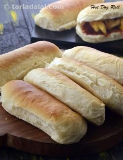 Hot Dog Roll, Homemade Hot Dog Roll recipe | by Tarla Dalal | Tarladalal.com | #41669 Homemade Hot Dog Buns, Homemade Hot Dogs, Italian Snacks, Hot Dog Rolls, Bun Recipe, Bread Recipes Homemade, Bread Rolls, Rolls Recipe, Dinner Rolls