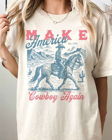 ☀️So many graphics!☀️ Here’s just a sample! Go check them out @violalaneboutique ! #vlb #violalaneboutique #boutique #boutiqueshopping #cowgirl #country #countrygraphictee #summer #boutiquefinds #boutiquefashion #freeshipping #fypage #shop #shopvlboutique Make America Cowboy Again, Western Style Graphic Print T-shirt For Country Festivals, Trendy Short Sleeve Rodeo T-shirt, Cheap Vintage T-shirt For Rodeo, Western Style Cotton Graphic T-shirt, Affordable Vintage T-shirt For Rodeo, Country Music Festival, Cowgirl Accessories, Boutique Fashion