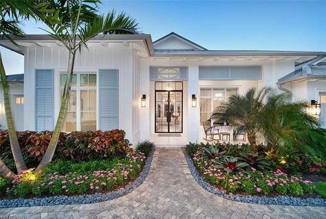 This 4495 square feet Single Family home has 5 bedrooms and 6 bathrooms. It is located at 715 Teal Ct, Naples, FL. Coastal Exterior Homes, Florida Homes Exterior, Coastal Home Exterior, Teal Door, Single Garage, Pelican Bay, House Florida, High Windows, Sliding Pocket Doors