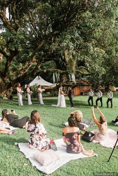 Rustic outdoor spring wedding ceremony with blanket guest seating {Alvea Studios} Rustic outdoor spring wedding ceremony with blanket guest seating {Alvea Studios} Blanket Seating Wedding, Floor Seating Wedding Ceremony, Blankets Wedding Ceremony, Boho Floor Seating Wedding, Picnic Wedding Ceremony, Spring Wedding Ceremony, Ceremony Arch Decor, Outdoor Spring Wedding, Rustic Spring Wedding