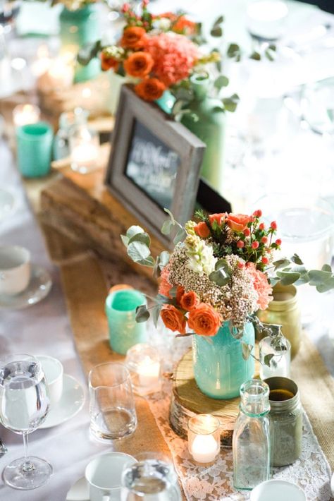 Turquoise mason jars wedding centerpiece and orange flowers #babybreath #weddingcenterpiece #centerpiece #masonjar Vintage Table Setting, Aqua Wedding, Eclectic Wedding, Fall Table Settings, Coral Wedding, Brooklyn Wedding, Orange Wedding, Fall Wedding Colors, Wedding Table Settings