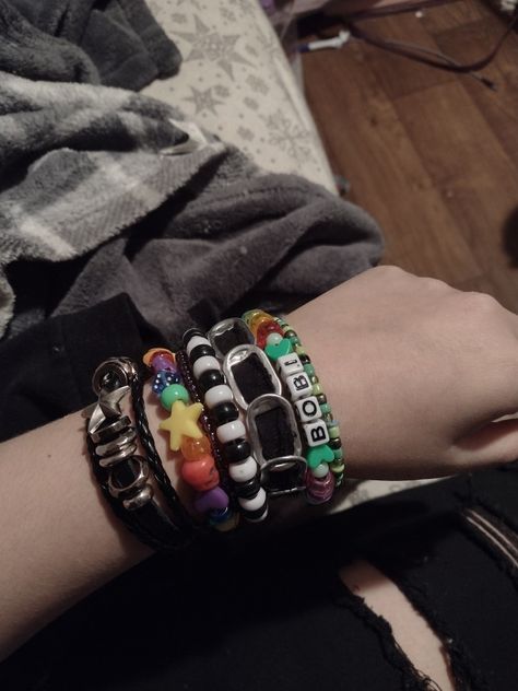 Band Bracelets Emo, Grunge Bead Bracelets, Layered Bracelets Grunge, Emo Bracelets Aesthetic, Beaded Bracelets Aesthetic Y2k, Metalhead Bracelets, Grudge Bracelets, Emo Beaded Bracelets, Punk Bracelets Diy