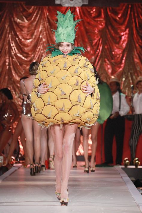 Leg, Fashion show, Ananas, Runway, Fashion, Fashion model, Costume design, Public event, Fashion design, Pineapple, Redhead Costume, White Christmas Outfit, Model Costume, Pineapple Costume, Brunch Attire, Asymmetrical Wedding Dress, Cute Bridesmaid Dresses, Fruit Costumes, Casual Wedding Attire