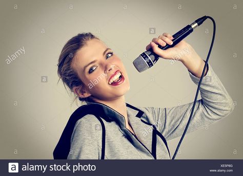 Holding A Microphone Pose, Microphone Pose, Holding Microphone Reference, Microphone Reference, Holding Microphone, Idea Board, Pose Reference Photo, Pose Reference, Over Ear Headphones