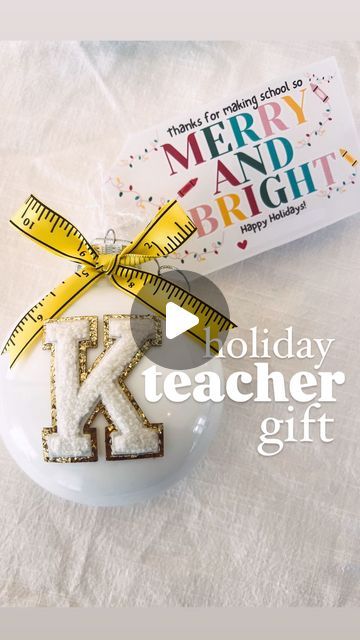 Andrea Clawson on Instagram: "dollar tree find: 1.25$ diy ornament turned into the cutest gift for teachers this holiday season ✏️ 🎀 🌲   This diy @dollartree tree plastic ornament is perfect for teachers + coworkers + school staff and school administrators  Simple holiday personalized gift to add to a box of sweet, a gift card or to gift for their christmas tree   I wanted to make sure this was a simple and inexpensive and it turned out adorable 🥰 Comment “link” for free printable   What I used: •Plastic ornament from dollartree  •acrylic paint •ruler ribbon  •letter chenille sticker patch from @amazon   share with friends + save this idea for a fun holiday craft night!   #christmascheer #parenting #diy #diycrafts #craftymom #craftymomma #teacher #teachergiftideas #dollartreecrafts #dol Diy Ornament Gifts For Coworkers, Diy Christmas Gifts For Teachers Cheap, Diy Teacher Christmas Ornaments, Diy Teacher Christmas Gift Ideas, Diy Teacher Ornaments, Teacher Ornaments Diy, Teacher Christmas Gift Ideas Inexpensive, Prek Activities, Diy Teacher Christmas Gifts