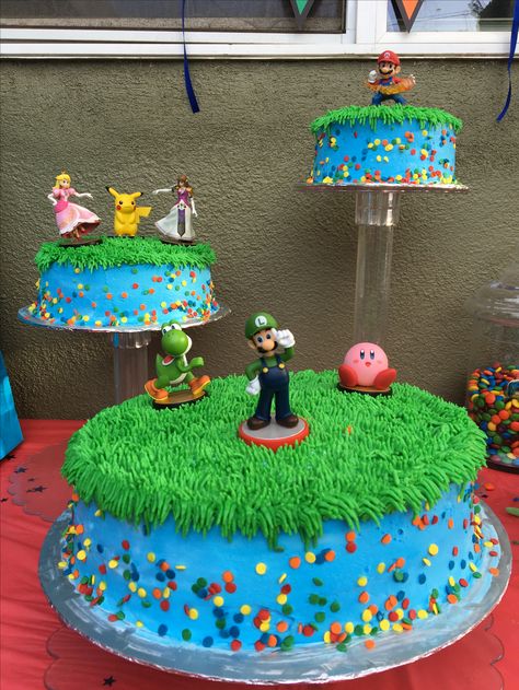 Super Smash Bros themed cake. After looking around I decided to make my own version of the popular video game. My nephew loved it!!! Smash Brothers Cake, Super Smash Bros Birthday Cake, Super Smash Bros Cake Ideas, Video Game Cakes For Boys, Smash Bros Birthday Party, Smash Bros Cake, Super Smash Bros Cake, Smash Bros Party, Super Smash Bros Party