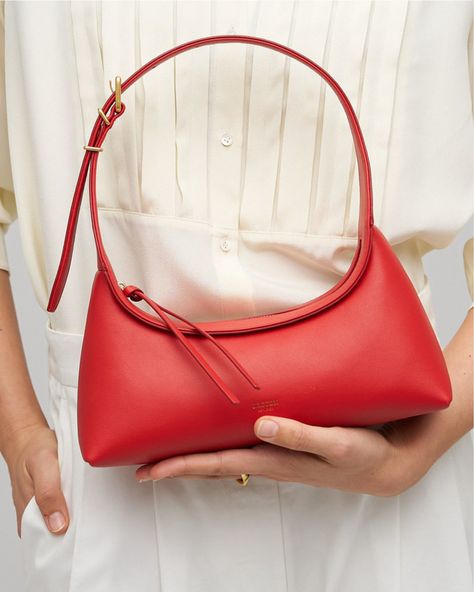 Most-loved | The Cinder Mini Baguette - Crafted from smooth leather, this modern take on a classic silhouette effortlessly transitions from day to night, perfect for any occasion.   Discover new bags in stores and online. Mini Baguette, Poppy Color, New Bags, Red Bag, Elements Of Style, Baguette Bag, Pocket Top, Small Wallet, Leather Care