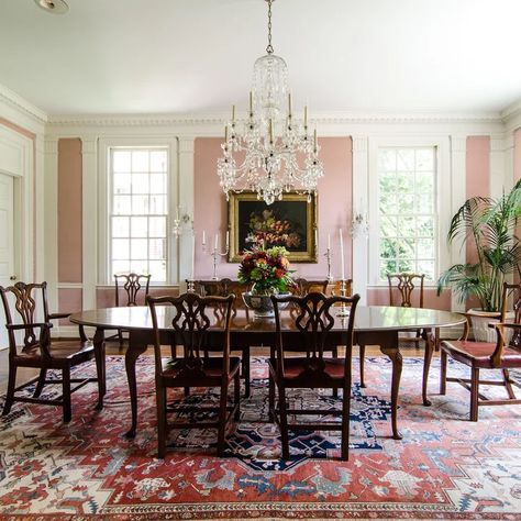 75 Traditional Dining Room Ideas You'll Love - February, 2022 | Houzz Dining Design Ideas, Pink Dining Room, White Wooden Chairs, Pink Dining Rooms, Light Pink Walls, Eclectic Dining Room, White Wainscoting, Dining Room Cabinet, Classic Dining Room