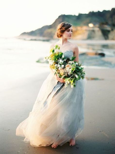 These dresses fit beach brides perfectly. If you plan to be married on the beach, check out these gowns for inspiration! Erich Mcvey, Ethereal Wedding Dress, Grey Wedding Dress, Ethereal Wedding, Beach Bride, Seaside Wedding, Blue Wedding Dresses, Gray Weddings, Bridal Photos