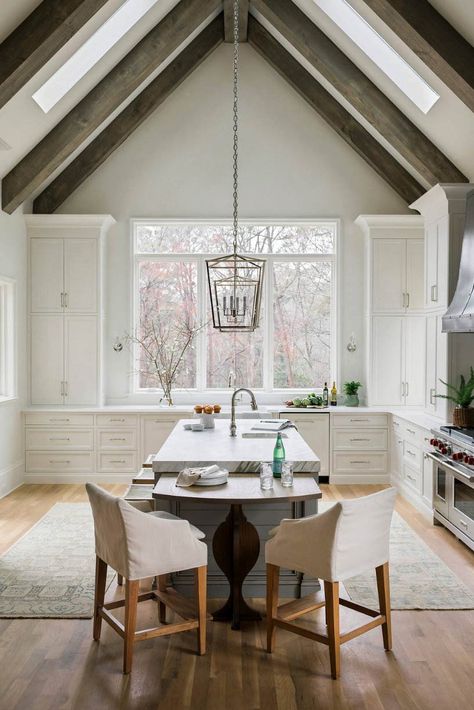 Vaulted Ceilings in the Kitchen: Pros and Cons - Plank and Pillow Vaulted Ceiling Decor, White Contemporary Kitchen, Rustic Remodel, Vaulted Ceiling Kitchen, Farmhouse Living Room Lighting, Kitchens Luxury, Rustic Modern Kitchen, Kitchen Ceiling, Vaulted Ceilings