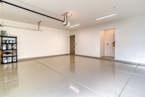 Make your garage a well-organized, stress-free area. We have renovated hundreds of garages throughout the GTA, and we can assist you in taking back your own. See more at - www.invinciblegarage.ca #garage #garagefloor #floor #garage #basement #garagefloor #grinding #polyaspartic #homeimprovements #garageflooring Custom Garage Cabinets, Garage Ceiling Storage, Garage Wall Storage, Garage Storage Solutions, Shop Lights, Small Garage, Garage Basement, Ceiling Storage, Overhead Storage