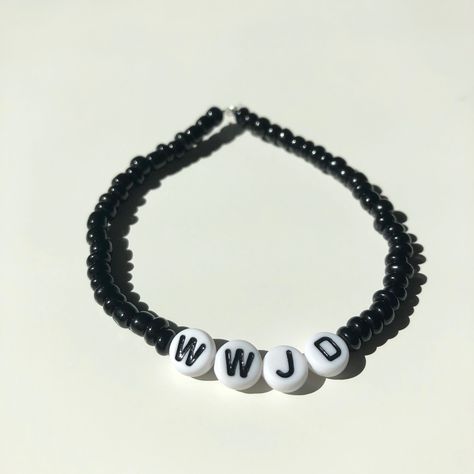 “What Would Jesus Do” black seed bead bracelet Cheap Black Beaded Bracelet With Letter Print, Casual Black Stretch Bracelet With Letter Beads, Cheap Black Wristband With Letter Beads, Black Wwjd Bracelet, Adjustable Black Wristband With Letter Beads, Wwjd Bracelet, Star Anklet, Letter Bead Bracelets, What Would Jesus Do