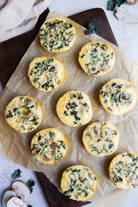 Full of flavor and so easy to make, these kale and mushroom egg bites are the perfect breakfast-on-the go for busy mornings. Each serving has 16 grams of protein, low in fat and carbs, these 6 ingredient kale egg bites are the perfect healthy breakfast to start your day off right! Kale Egg Bites, Kale And Mushroom Egg Bites, Mushroom Egg Bites, Kale And Mushroom, Postpartum Recipes, Protein Egg, Baked Kale, High Protein Breakfast Recipes, How To Cook Kale