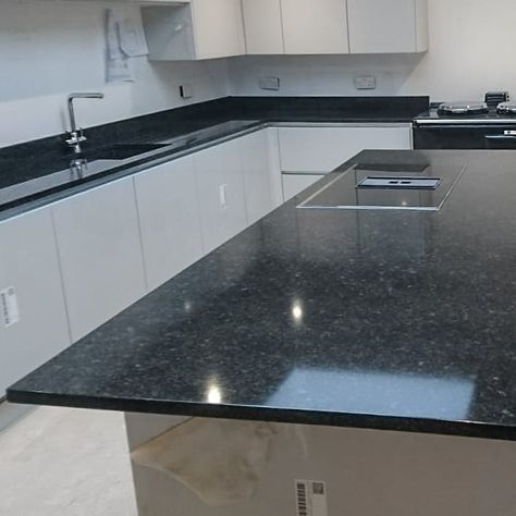 A view of the island and L-shape completed with the Angolan Silver Granite. This type of granite really stands out against the sleek and modern style our client wanted. Kitchen Platform Granite Colour, Kitchen Platform Granite, Kitchen Platform, Types Of Granite, Kitchen Cupboard Designs, Granite Colors, Kitchen Design Plans, Kitchen Cupboard, Kitchen Cupboards