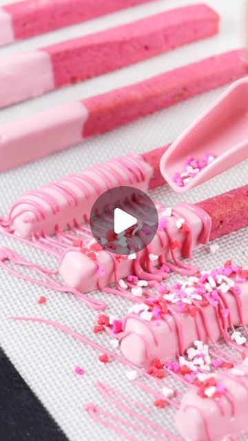 Liz Nicolaou on Instagram: "Strawberry Cookie Sticks 💕 Recipe is my no spread sugar cookie recipe with added pink colouring, strawberry extract and freeze-dried strawberries (in recipe highlights) Tools used linked to my amazon storefront - linktree in bio Sprinkles: @sweet.stamp halo sprinkles - use code LOVE10 for 10% off at sweetstamp.online #cookies #strawberrycookies #cookiesticks #valentinescookıes #valentinesbaking #cookieideas #pinktreats #loveisbakeable" No Spread Sugar Cookie Recipe, Valentines Party Food, Strawberry Cookie, Strawberry Extract, Pink Treats, Valentines Baking, Cookie Sticks, Valentine's Party, Sweet Tables