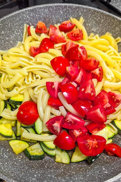 Indulge in the beauty of uncomplicated cooking with our 4-Ingredient Zucchini and Tomato Pasta recipe. This delightful dish offers a symphony of flavors in every bite. With just four key ingredients, it's a testament to the power of simplicity. Fresh zucchini and ripe tomatoes create a harmonious blend, complemented by perfectly cooked pasta. Whether you're short on time or looking for a wholesome meal, this recipe has you covered. Enjoy a burst of freshness and taste. Pasta With Zucchini And Tomatoes, Burst Tomatoes, Zucchini And Tomato, Tomato Pasta Recipe, Fresh Zucchini, Zucchini Tomato, Cooked Pasta, Tomato Pasta, 4 Ingredient