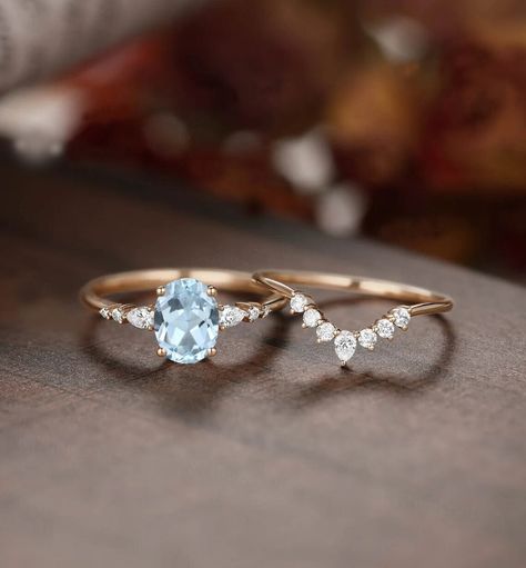 "1.8ct vintage aquamarine engagement ring set rose gold ring set women custom jewelry March birthstone ring moissanite ring set We are Manufacturer and Exporter of all type of Silver and Gold Jewelry---------- ** We Offer CUSTOM MADE SERVICES and WHOLESALE DISCOUNTS on LARGE QUANTITY PURCHASE. 》DIMENSIONS《 ❥ All Pieces Have 925 Stamp/14k/18k ❥ Main Gemstone :- Aquamarine ❥ Shape :-Oval ❥ Size :- 7X9 MM ❥ Material :- Sterling Silver/14k/18k White/Yellow/Rose Gold) ❥ Purity :- 925/14k/18k  ❥ Finis Moissanite Engagement Ring Simple, Rose Gold Aquamarine Ring, Aquamarine Wedding Ring Set, Engagement Rings Aquamarine, Aquamarine Birthstone Ring, Aquamarine Wedding Ring, Rose Gold Ring Set, Simple Rings, Aquamarine Birthstone