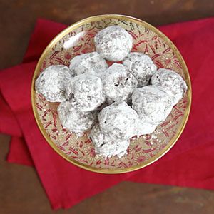 Bourbon Balls offer up a powerful punch while packaged in a small bite. These sweet, no-bake treats are a favored gift and a perfect nibble for parties. Bourbon Balls Recipe, Southern Living Recipes, Bourbon Balls, Fudge Pie, Christmas Sweets, Balls Recipe, Christmas Goodies, Holiday Cooking, Chocolate Truffles