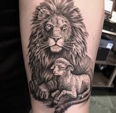 Lion And The Lamb Tattoo, Lion And Lamb Tattoo, Lion Tattoos For Men, Lion And Rose Tattoo, Simple Black Tattoos, Lion Tattoo On Finger, Lion Cub Tattoo, Lion And Lioness Tattoo, Lion Back Tattoo