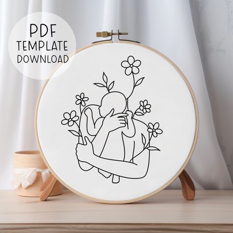 "This is a pattern TEMPLATE for the design shown above. It is for hand embroidery, and is NOT suitable for machine embroidery. You will not receive any physical products as this is a DIGITAL DOWNLOAD ONLY. You will receive a downloadable A4 sized PDF file for this pattern. It comes with patterns scaled to fit 3\", 4\", 5\", 6\", 7\" and 8\" hoops. It is up to you to choose which size hoop best suits the design you choose (tip: designs with lots of small details are usually better suited to larger hoops). You will need access to a printer to print your PDF pattern, and then you can transfer it to your fabric with an embroidery suitable pen or pencil. You will also receive a basic embroidery guide for beginners, however, please be aware this is a short and general guide and it does not conta Mum Embroidery, Baby Shower Embroidery, Mom Holding Baby, Mom Embroidery, Baby Birth Gifts, Handmade Baby Shower Gift, Digital Embroidery Patterns, Print Embroidery, Types Of Stitches