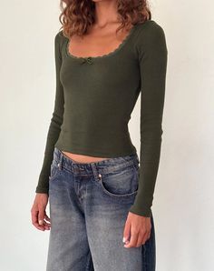 This long sleeve fave features a lace trim neckline finished with a tonal bow at the centre front in a ribbed olive fabric. Long Sleeve Fitted Top Outfit, Tight Long Sleeve Shirt Outfit, Long Sleeve Shirts Aesthetic, Long Sleeve Shirts Outfits, Green Long Sleeve Outfit, Uni Wardrobe, Olive Outfit, Green Top Outfit, Olive Green Outfit