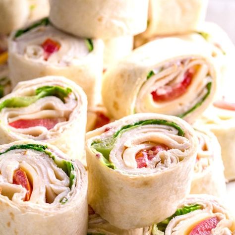 Costco sells a roasted chicken & Swiss roll-ups platter that "stays" together and looks so appealing! Make it with turkey if you insist but this is a roll ups recipe to try! The cream cheese spread helps the rolls stay together without any toothpicks and it pairs so well with the meat! Meat Roll Ups, Turkey Roll, Meat Roll, Pinwheel Sandwiches, Costco Chicken, Pinwheel Appetizers, Roll Ups Recipes, Cream Cheese Spread, Cranberry Cream Cheese