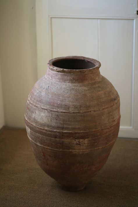 Antique vessels from Turkey | urn, olive jar, terracotta pots One of a kind, vintage pieces to give your interior that modern farmhouse, classic Cotswold cottage, or timeless country home style. Décor pieces that are earthy, organic and artisan made, originally used to store olive oil and grains, now repurposed as unique antique homewares. With their own imperfections, please expect that terracotta pots are sold in their original condition, naturally aged with rustic patina and texture. Mediterranean Pots, Antique Vessels, Mediterranean Terracotta, Clay Lamps, Country Home Style, Vintage Terracotta Pots, Terracotta Vases, Ornamental Garden, Cotswold Cottage