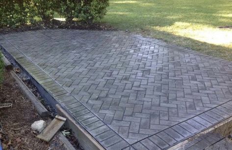 A stamped concrete driveway Concrete Patio Extension Ideas, Colored Concrete Patio, Patio Extension Ideas, Stamped Concrete Driveway, Brick Border, Interior Brick, Concrete Patio Designs, Concrete Patios, Patio Steps