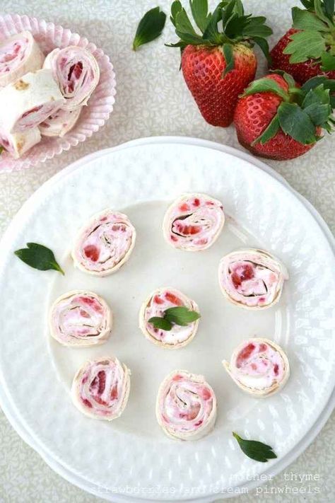 Strawberries And Cream Pinwheels | 23 Adorable Pinwheel Foods To Make For Someone You Love Pinwheel Snacks, Wedding Finger Foods, Mother Thyme, Cream Cheese Pinwheels, Cheese Pinwheels, Strawberry Tea, Pinwheel Recipes, Fun Recipes, Tea Sandwiches