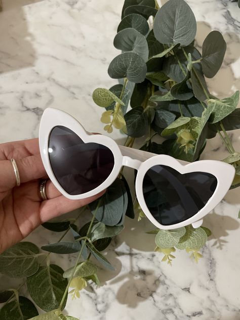 These heart shaped sunglasses  are one of the top 2023 wedding trends and will add that fun element to your special day. Approx size: Frame width 155mm, Temple Length 142mm,Lens Height 65mm height x 55mm width  These glasses can also be used for birthdays, hen party's and special occasions! 2023 Wedding Trends, Swift Party, Wedding Sunglasses, Video Wedding, Taylor Swift Party, Sunglasses White, White Sunglasses, Shaped Sunglasses, Heart Shaped Sunglasses