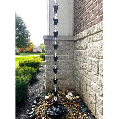 Rain chains look great work great and sound great! No more boring downspouts! Install one of these at your front porch or backyard for added curb appeal. This rain chain features farmhouse bucket cups, powder coated, heavy duty iron and detailed craftsmanship. It comes assembled and measures 8.5 ft long. It is sufficient for most home gutter systems. Additional links or cups are available at U-nitt. A gutter clip is included for easy do-it-yourself installation. Gracie Oaks Color: Black | Gracie Chain Gutter Downspout, Downspout Drainage, Copper Rain Chains, Rain Sound, Outdoor Fencing, Rain Chains, Outdoor Thermometer, Rain Chain, Outdoor Holidays