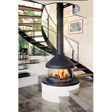 Focus Fireplaces, Design Camino, Contemporary Fireplace Designs, Standing Fireplace, Hanging Fireplace, نباتات منزلية, Stairs Architecture, Freestanding Fireplace, European Home