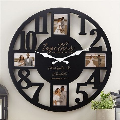 * Engraved with 2 lines of text and date   * Constructed of MDF with a solid black finish * Measures 23.5W x 1.75D * Includes 4 photo frame openings; 2 vertical 5x3.5 and 2 horizontal 5x3.5 * Large sawtooth hanger on back  * Requires 1 AA Battery, not included * Imported The Together They Built Personalized Picture Frame Wall Clock makes a unique gift for the happy couple. Adding your own favorite pictures gives each clock its own personal style. Photo Clock Wall, Clocks Diy Crafts, Family Clock, Photo Wall Clocks, Personalized Wall Clock, Fireworks Background, Best Photo Frames, Photo Clock, Personalized Clocks