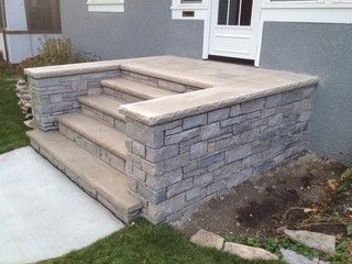 Front Concrete landscape steps along with stone entryway steps with modified buttresses.  By English Stone Front Step Ideas, Front Porch Stone Steps, Concrete Front Steps, Cement Steps, Front Porch Stone, Stone Entryway, Step Ideas, Patio Stairs, Stone Porches