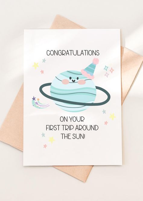 PRICES MAY VARY. Celebrate a Milestone: This adorable 1st birthday card is the perfect way to celebrate a significant milestone in a child's life. With a space and planets theme, it's designed to captivate young imaginations. Heartfelt Congratulations: The card carries the sweet message "CONGRATULATIONS ON YOUR FIRST TRIP AROUND THE SUN," expressing the joy and excitement of the child's first year. It's a heartfelt way to mark this special day. High-Quality and Handmade: Crafted with love and ca Space And Planets, Kids Birthday Card, First Birthday Card, 1st Birthday Card, 1 Year Birthday, Birthday Card Sayings, First Birthday Cards, Baby Boy First Birthday, 1st Birthday Cards