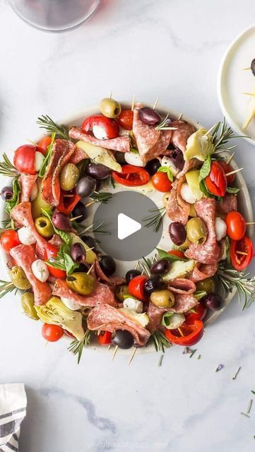 Krista | Healthy Food+Fitness on Instagram: "This Festive Antipasto Skewers Christmas Wreath is such a fun appetizer to make for the holidays 🎄Made with peppered salami, mozzarella balls, olives, cherry peppers, artichokes and fresh basil. An easy and healthy appetizer that’s sure to disappear! For the Recipe go to @joyfulhealthyeats and click the LINKIN.BIO or go to https://www.joyfulhealthyeats.com/easy-festive-christmas-wreath-antipasto-skewers/ #appetizers #appetizerideas #holidayfood #holidayrecipes #holidayparty #antipasto #charcuterie #charcuterieboard #imsomartha #buzzfeast #buzzfeedfood #huffposttaste #makeitdelicious #feedfeed #feedyoursoul #feedyourbody #meatandcheese #whatsonmyplate #whatsfordinner #joyfulhealthyeats #food52grams" Peppered Salami, Antipasto Wreath, Cocktails Appetizers, Cherry Peppers, Christmas Appetizers Easy, Antipasto Skewers, Mozzarella Balls, Christmas Appetizer, Cocktail Appetizers